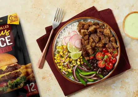 Angus beef protein bowl with rice, black beans, corn and tomatoes